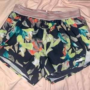 Comfy and colorful running shorts with spandex lining.